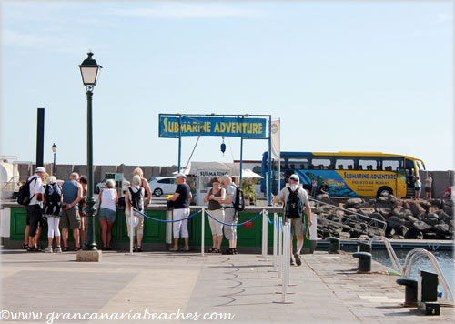 Tourist waiting for bus in Mogan, Gran Canaria